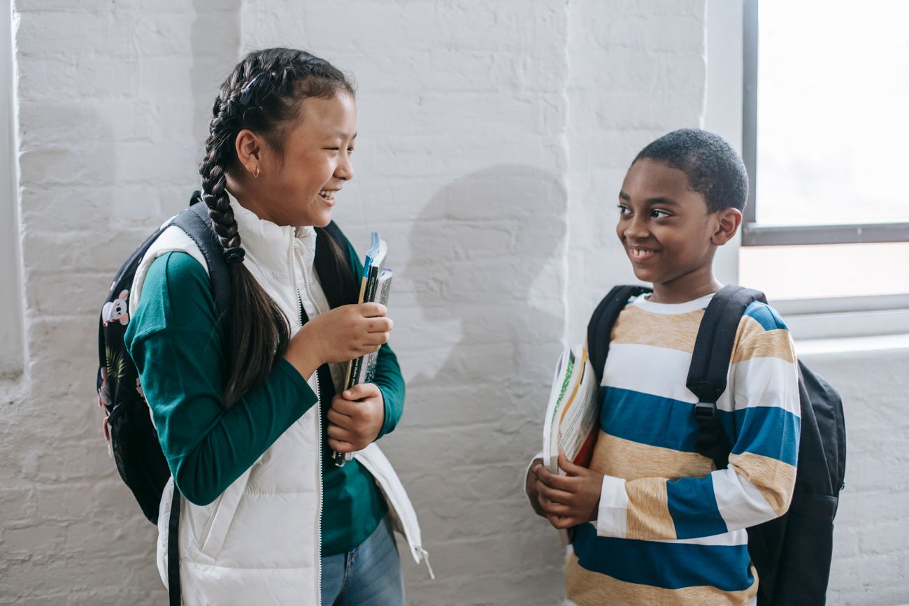 Diverse schoolchildren together at school